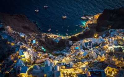 an aerial view of Santorini city at night